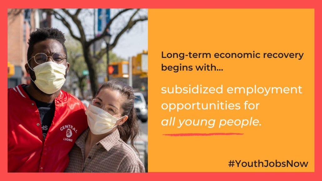 Two young people of color masked together, outside, in a city. We need employment opportunities for all young people.